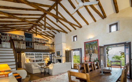 Lounge / dining area with ceiling fans